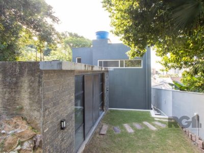 Casa à venda com 360m², 5 quartos, 2 suítes, 3 vagas no bairro Tristeza em Porto Alegre - Foto 29