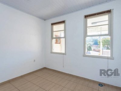 Casa à venda com 165m², 4 quartos, 2 vagas no bairro Medianeira em Porto Alegre - Foto 18