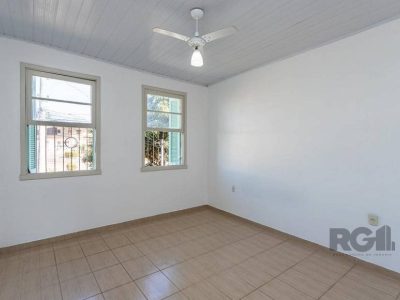 Casa à venda com 165m², 4 quartos, 2 vagas no bairro Medianeira em Porto Alegre - Foto 21