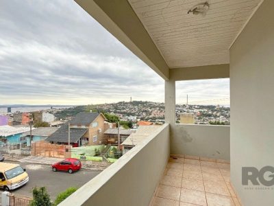 Casa à venda com 325m², 3 quartos, 1 suíte, 5 vagas no bairro Santa Tereza em Porto Alegre - Foto 28