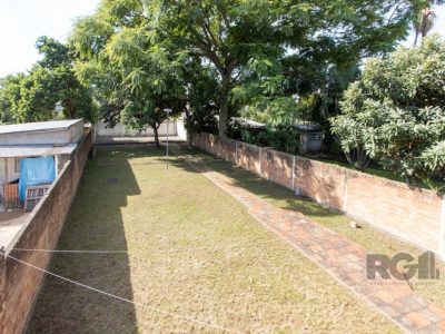 Casa à venda com 250m², 3 quartos, 1 suíte, 3 vagas no bairro Medianeira em Porto Alegre - Foto 21