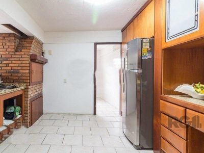 Casa à venda com 540m², 5 quartos, 4 suítes, 4 vagas no bairro Três Figueiras em Porto Alegre - Foto 24