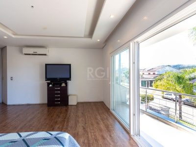 Casa à venda com 463m², 4 quartos, 4 suítes, 4 vagas no bairro Ipanema em Porto Alegre - Foto 37