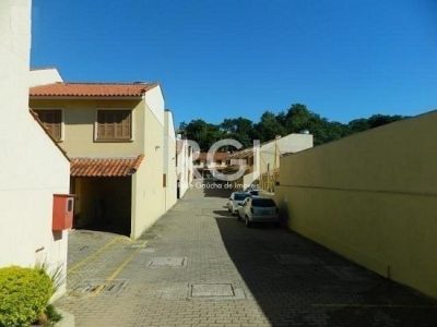 Casa Condominio à venda com 95m², 3 quartos, 1 vaga no bairro Partenon em Porto Alegre - Foto 2