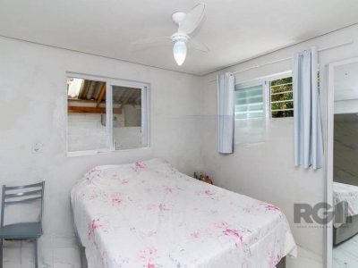 Casa à venda com 117m², 3 quartos, 1 suíte, 3 vagas no bairro Azenha em Porto Alegre - Foto 13