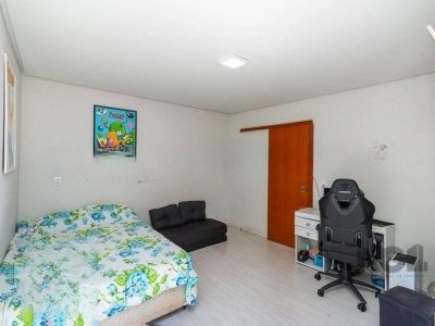 Casa à venda com 117m², 3 quartos, 1 suíte, 3 vagas no bairro Azenha em Porto Alegre - Foto 10