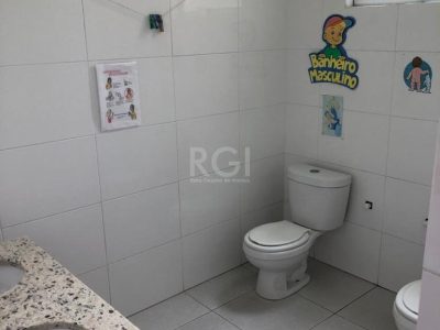 Casa à venda com 440m², 6 quartos, 3 vagas no bairro Partenon em Porto Alegre - Foto 5