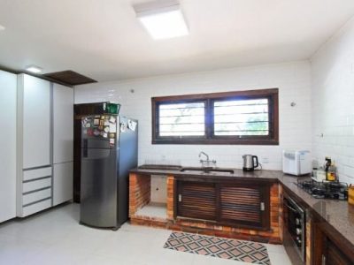 Casa à venda com 250m², 3 quartos, 1 suíte, 5 vagas no bairro Ipanema em Porto Alegre - Foto 16