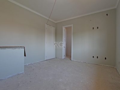 Casa Condominio à venda com 101m², 3 quartos, 1 suíte, 2 vagas no bairro Jardim Itu em Porto Alegre - Foto 17