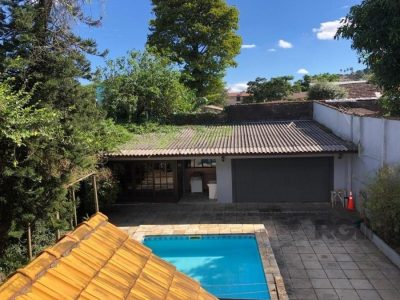 Casa à venda com 365m², 4 quartos, 3 suítes, 5 vagas no bairro Partenon em Porto Alegre - Foto 4