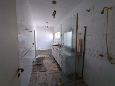 Casa à venda com 377m², 3 quartos, 2 suítes, 4 vagas no bairro Higienópolis em Porto Alegre - Foto 10