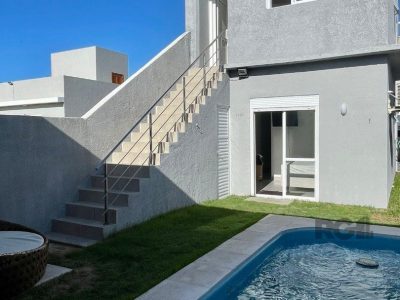 Casa à venda com 150m², 4 quartos, 1 suíte, 2 vagas no bairro Jardim Beira Mar em Capão da Canoa - Foto 4