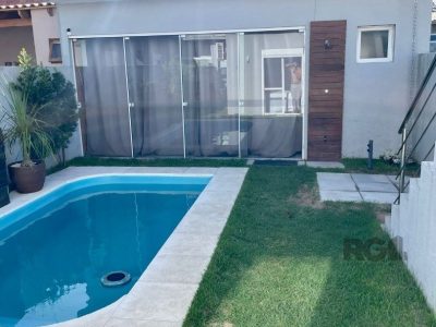 Casa à venda com 150m², 4 quartos, 1 suíte, 2 vagas no bairro Jardim Beira Mar em Capão da Canoa - Foto 2