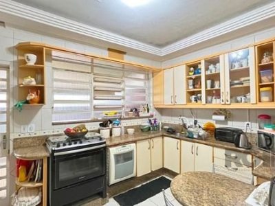 Casa à venda com 320m², 5 quartos, 3 suítes, 8 vagas no bairro Ipanema em Porto Alegre - Foto 14