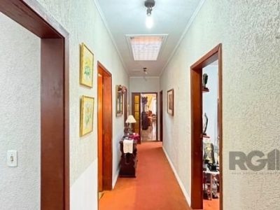 Casa à venda com 320m², 5 quartos, 3 suítes, 8 vagas no bairro Ipanema em Porto Alegre - Foto 29