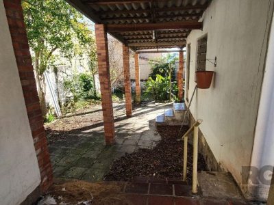 Casa à venda com 174m², 4 quartos, 3 vagas no bairro Santo Antônio em Porto Alegre - Foto 11