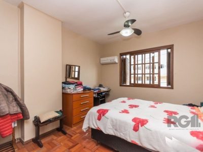 Casa à venda com 229m², 3 quartos, 1 suíte, 2 vagas no bairro Jardim Botânico em Porto Alegre - Foto 15