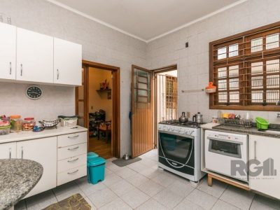 Casa à venda com 229m², 3 quartos, 1 suíte, 2 vagas no bairro Jardim Botânico em Porto Alegre - Foto 19