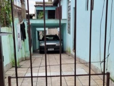 Casa à venda com 110m², 3 quartos, 2 vagas no bairro Santo Antônio em Porto Alegre - Foto 7