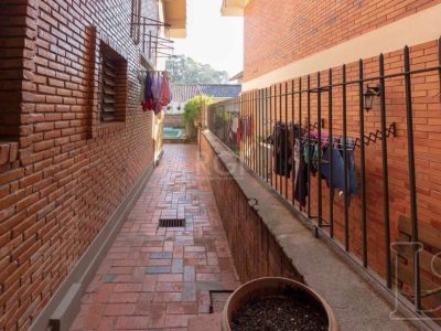 Casa à venda com 349m², 4 quartos, 1 suíte, 3 vagas no bairro Tristeza em Porto Alegre - Foto 41