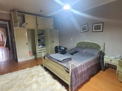 Casa à venda com 251m², 3 quartos, 1 suíte, 2 vagas no bairro Ipanema em Porto Alegre - Foto 14