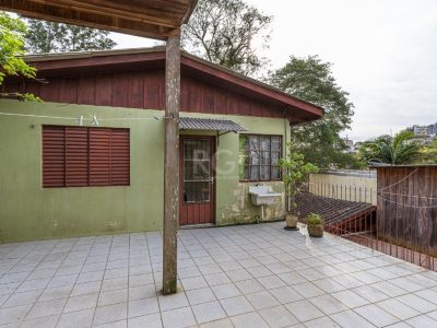 Casa à venda com 430m², 3 quartos no bairro Santa Tereza em Porto Alegre - Foto 49