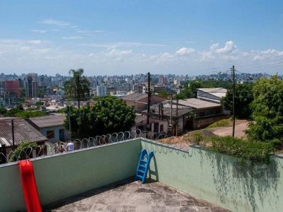 Casa à venda com 177m², 4 quartos, 2 suítes, 6 vagas no bairro Santa Tereza em Porto Alegre - Foto 9