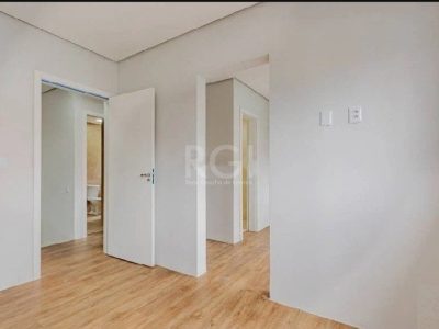 Casa à venda com 220m², 3 quartos, 2 suítes, 2 vagas no bairro Partenon em Porto Alegre - Foto 13