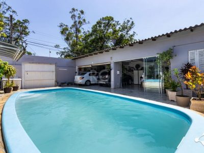 Casa à venda com 215m², 3 quartos, 1 suíte, 4 vagas no bairro Jardim Planalto em Porto Alegre - Foto 2