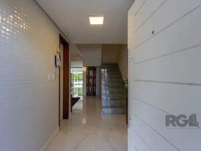 Casa à venda com 410m², 3 quartos, 3 suítes, 3 vagas no bairro Ipanema em Porto Alegre - Foto 5