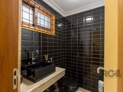 Casa à venda com 410m², 3 quartos, 3 suítes, 3 vagas no bairro Ipanema em Porto Alegre - Foto 6