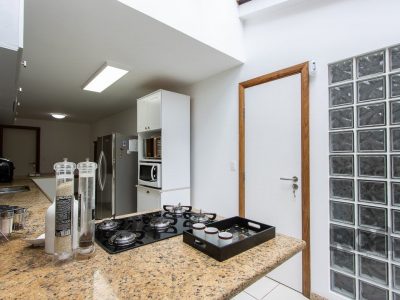 Casa à venda com 410m², 3 quartos, 3 suítes, 3 vagas no bairro Ipanema em Porto Alegre - Foto 35