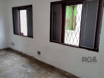 Casa à venda com 247m², 4 quartos, 4 vagas no bairro Partenon em Porto Alegre - Foto 21