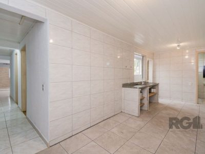 Casa à venda com 239m², 5 quartos, 1 suíte, 3 vagas no bairro Vila Ipiranga em Porto Alegre - Foto 18