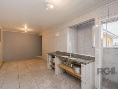 Casa à venda com 239m², 5 quartos, 1 suíte, 3 vagas no bairro Vila Ipiranga em Porto Alegre - Foto 21