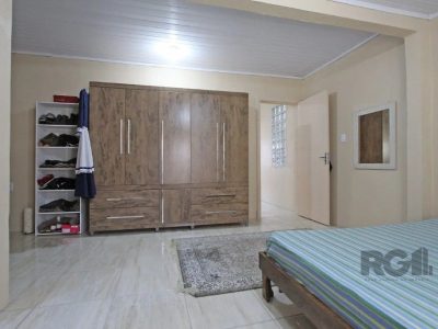 Casa à venda com 239m², 5 quartos, 1 suíte, 3 vagas no bairro Vila Ipiranga em Porto Alegre - Foto 9