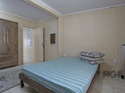 Casa à venda com 239m², 5 quartos, 1 suíte, 3 vagas no bairro Vila Ipiranga em Porto Alegre - Foto 10