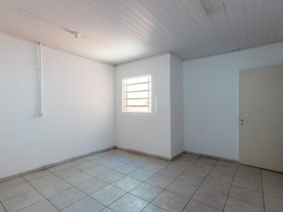 Casa à venda com 232m², 3 quartos, 2 vagas no bairro Navegantes em Porto Alegre - Foto 37