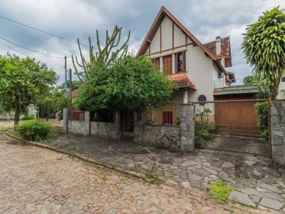 Casa à venda com 411m², 3 quartos, 1 suíte, 4 vagas no bairro Medianeira em Porto Alegre - Foto 49