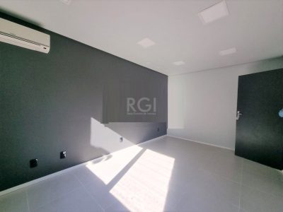 Casa à venda com 300m², 4 quartos, 2 suítes, 4 vagas no bairro Higienópolis em Porto Alegre - Foto 32