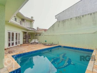 Casa à venda com 350m², 4 quartos, 4 suítes, 2 vagas no bairro Jardim Itu em Porto Alegre - Foto 30