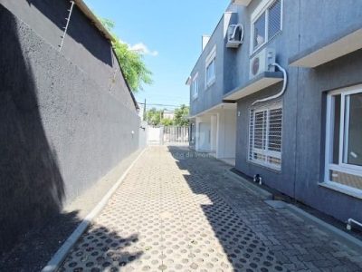 Casa Condominio à venda com 104m², 3 quartos, 1 suíte, 1 vaga no bairro Tristeza em Porto Alegre - Foto 26