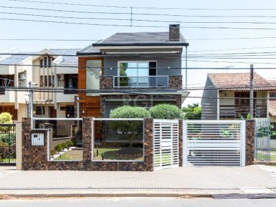 Casa à venda com 420m², 3 quartos, 3 suítes, 8 vagas no bairro Ipanema em Porto Alegre - Foto 6