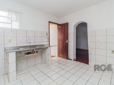 Casa à venda com 106m², 3 quartos, 4 vagas no bairro Jardim Europa em Porto Alegre - Foto 30