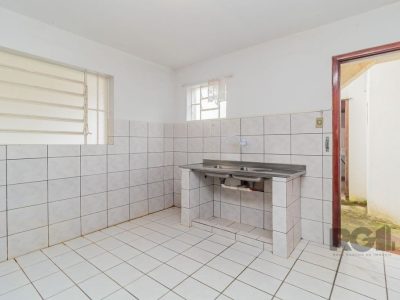 Casa à venda com 106m², 3 quartos, 4 vagas no bairro Jardim Europa em Porto Alegre - Foto 32