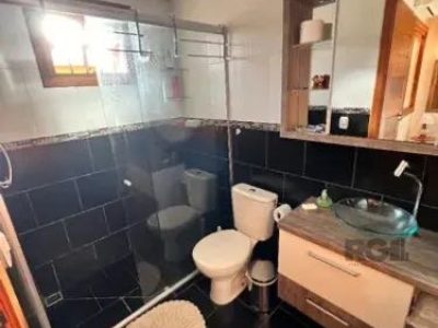 Casa à venda com 205m², 3 quartos, 1 suíte, 4 vagas no bairro Partenon em Porto Alegre - Foto 11