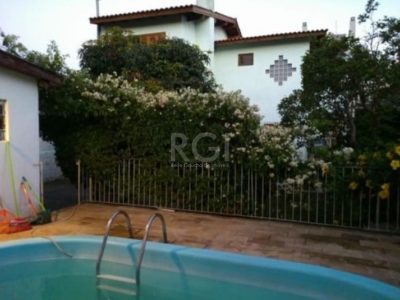 Casa à venda com 200m², 3 quartos, 3 suítes no bairro Jardim Botânico em Porto Alegre - Foto 4