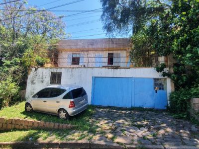 Casa à venda com 200m², 5 quartos, 1 suíte, 4 vagas no bairro Santa Tereza em Porto Alegre - Foto 34