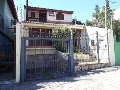 Casa à venda com 184m², 3 quartos, 1 suíte, 1 vaga no bairro Santo Antônio em Porto Alegre - Foto 4