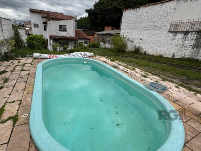 Casa à venda com 299m², 5 quartos, 1 suíte, 5 vagas no bairro Santa Tereza em Porto Alegre - Foto 16